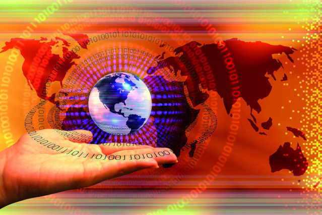 im Hintergrund ist die Weltkarte und im Vordergrund ist eine Hand, über der eine Weltkugel schwebt, sowie digitale Zahlen abgebildet (Quelle: Fotolia) im Hintergrund ist die Weltkarte und im Vordergrund ist eine Hand, über der eine Weltkugel schwebt, sowie digitale Zahlen abgebildet
